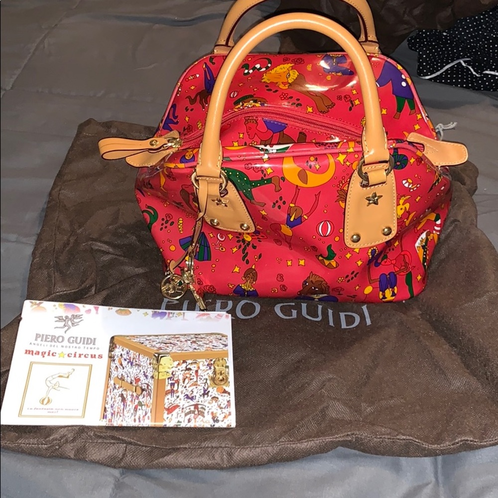 Piero guidi red vinyl magic circus handbag